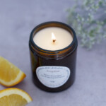 bougie parfumee fleur oranger allumee vue de haut 150g